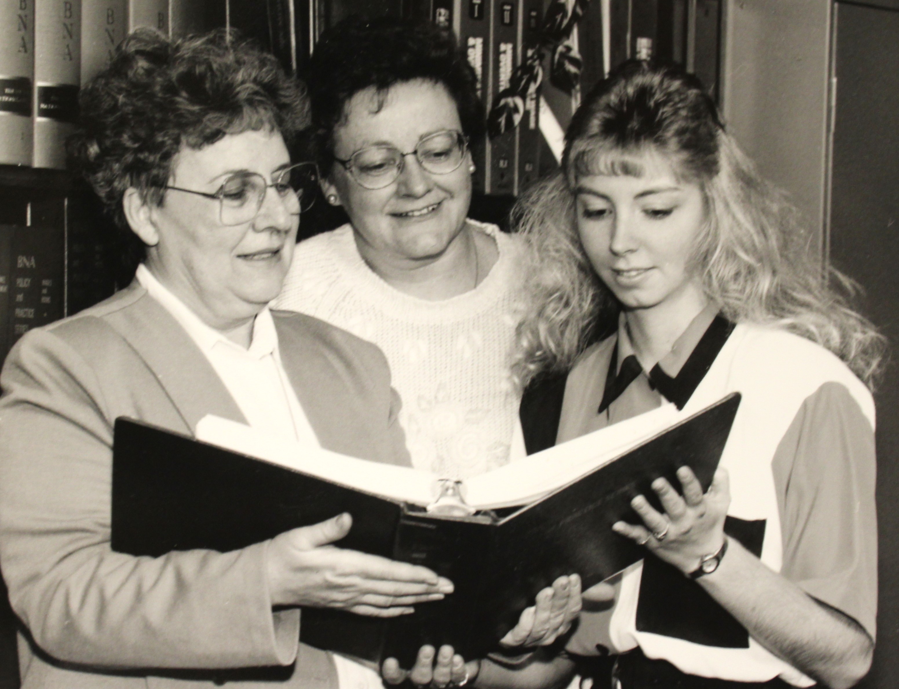 Three employees of the Wadena 첥, on campus in 1994